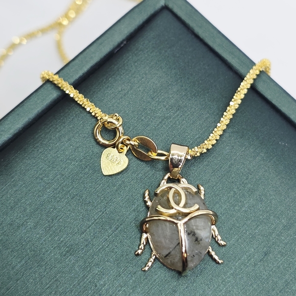 CHANEL Gold and Silver Scarab/ Bettle Necklace - Picture 1 of 4